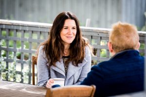 Woman in conversation