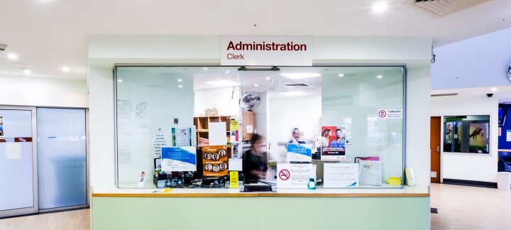 A long shot of the Administration Clerk desk.