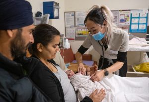 Staff, parents and baby